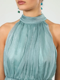 A wholesale clothing model wears jst10202-organza-halter-neck-green-dress, Turkish wholesale Dress of Juste