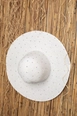 A wholesale clothing model wears kam13590-full-stone-wide-women's-straw-hat-white, Turkish wholesale  of 