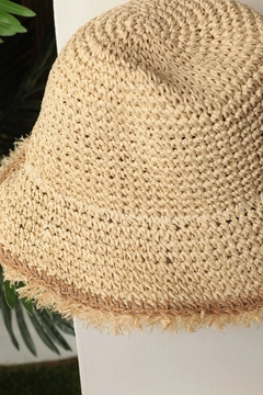 A wholesale clothing model wears kam13587-hand-knitted-fringed-women's-straw-hat-beige, Turkish wholesale Hat of Kaktus Moda