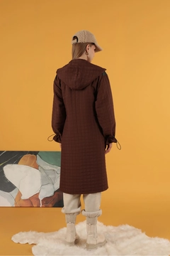 A wholesale clothing model wears kam11568-leather-fabric-garni-detail-jacquard-women's-trench-coat-brown, Turkish wholesale Trenchcoat of Kaktus Moda