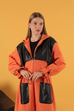 A wholesale clothing model wears kam11572-leather-fabric-garni-detail-jacquard-women's-trench-coat-orange, Turkish wholesale Trenchcoat of Kaktus Moda