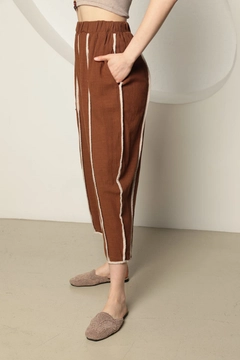 A wholesale clothing model wears kam13305-linen-fabric-piping-women's-shalwar-brown, Turkish wholesale Shawl of Kaktus Moda