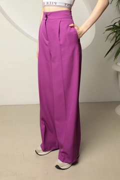 A wholesale clothing model wears kam13269-atlas-fabric-women's-palazzo-trousers-purple, Turkish wholesale Pants of Kaktus Moda