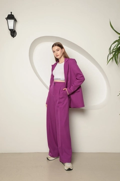 A wholesale clothing model wears kam13269-atlas-fabric-women's-palazzo-trousers-purple, Turkish wholesale Pants of Kaktus Moda