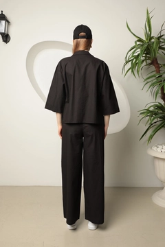 A wholesale clothing model wears kam13501-poplin-fabric-women's-suit-black, Turkish wholesale Suit of Kaktus Moda