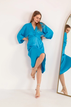 A model wears KAM10442 - Satin Fabric Front Twist Dress - Blue, wholesale Dress of Kaktus Moda to display at Lonca