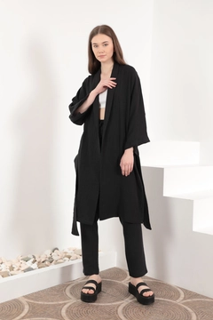 A wholesale clothing model wears KAM10820 - Muslin Fabric Oversize Women's Kimono - Black, Turkish wholesale Kimono of Kaktus Moda