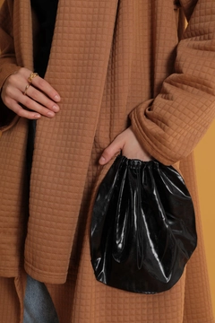 A wholesale clothing model wears kam11694-honeycomb-fabric-oversize-pocket-garni-detail-women's-cardigan-tan, Turkish wholesale Cardigan of Kaktus Moda