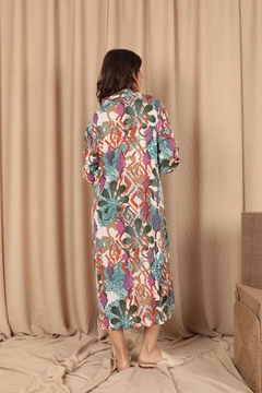 A wholesale clothing model wears kam12444-viscose-printed-fabric-magnetic-collar-long-women's-dress-cinnamon, Turkish wholesale Dress of Kaktus Moda
