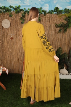 A wholesale clothing model wears kam12681-viscose-fabric-embroidered-women's-dress-oil-green, Turkish wholesale Dress of Kaktus Moda