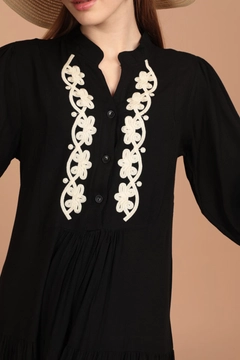 A wholesale clothing model wears kam12915-viscose-fabric-front-robe-embroidered-women's-dress-black, Turkish wholesale Dress of Kaktus Moda