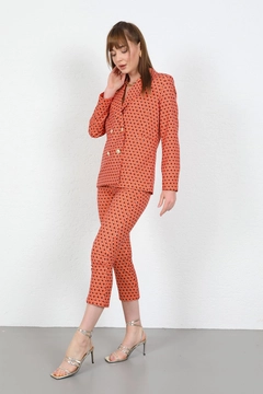 A wholesale clothing model wears 23615 - Pants - Orange, Turkish wholesale Pants of Kaktus Moda