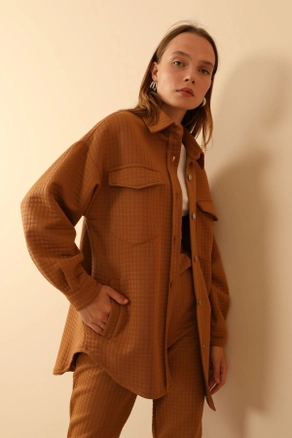 A model wears 23850 - Jacket - Tan, wholesale undefined of Kaktus Moda to display at Lonca