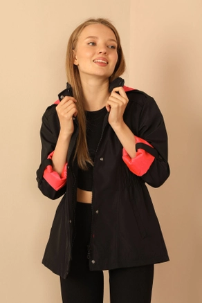 A model wears 30950 - Raincoat - Black And Fuchsia, wholesale undefined of Kaktus Moda to display at Lonca