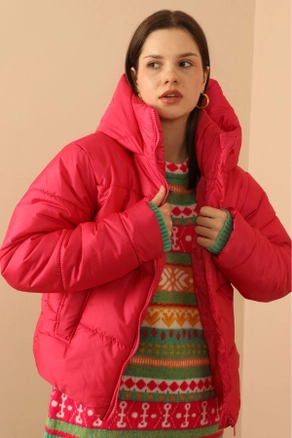 A model wears 33797 - Coat - Fuchsia, wholesale undefined of Kaktus Moda to display at Lonca