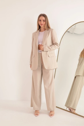 A model wears KAM10706 - Jacket - Beige, wholesale Jacket of Kaktus Moda to display at Lonca
