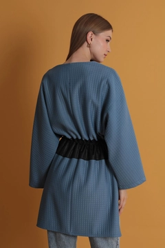 A wholesale clothing model wears kam11711-oversize-women's-sweat-with-honeycomb-fabric-garnish-indigo, Turkish wholesale Sweatshirt of Kaktus Moda
