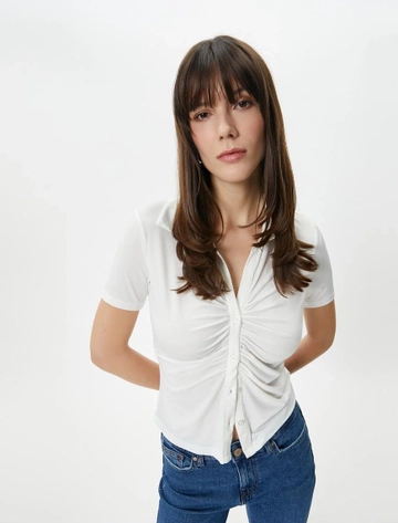A wholesale clothing model wears  Draped Buttoned Short Sleeve Shirt - White
, Turkish wholesale Shirt of Koton