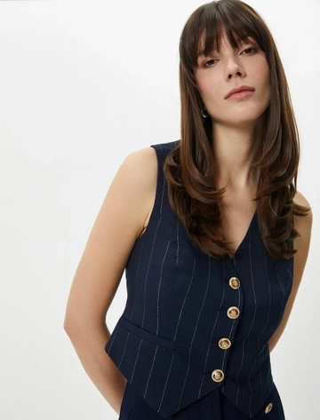 A wholesale clothing model wears  Gold Buttoned Flannel Pocket V-Neck Vest - Navy Blue
, Turkish wholesale Vest of Koton