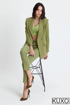 A model wears KUX10009 - Kuxo Blash Jacket-Pants Set, wholesale undefined of Kuxo to display at Lonca