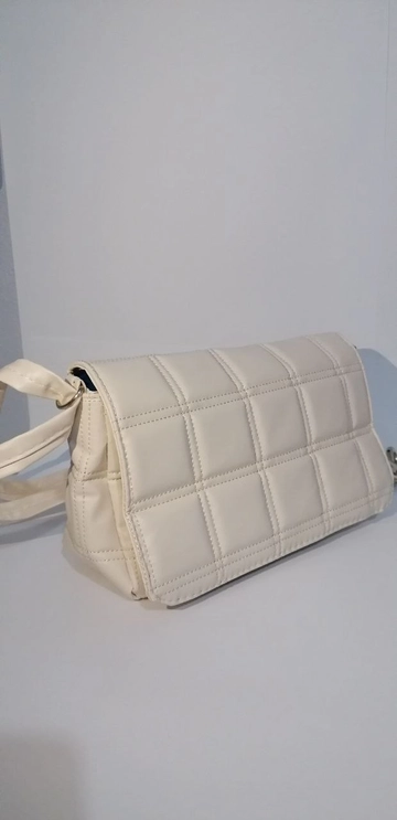 A wholesale clothing model wears  36 Clutch Bag
, Turkish wholesale Bag of Kuxo
