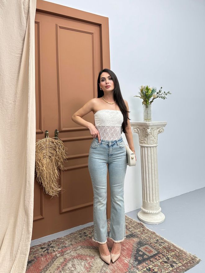 LACARINO Jeans De Cintura Alta Com Borla De Cintura Alta Com Detalhes Em Azul Claro Roupas por atacado Algodão