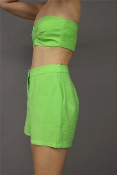 A wholesale clothing model wears lfn11456-shorts-pistachio-green, Turkish wholesale Shorts of Lefon