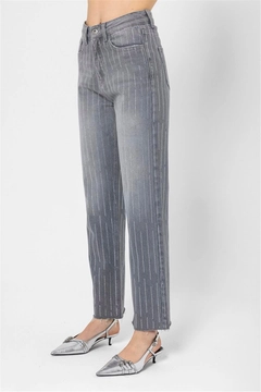 A wholesale clothing model wears lfn11458-glitter-detailed-denim-trousers-ice-gray, Turkish wholesale Jeans of Lefon