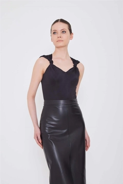 A wholesale clothing model wears lfn11483-knot-detailed-sleeveless-blouse-black, Turkish wholesale Blouse of Lefon