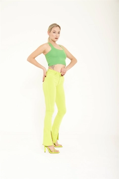 A wholesale clothing model wears lfn11532-slit-detailed-jeans-green, Turkish wholesale Jeans of Lefon