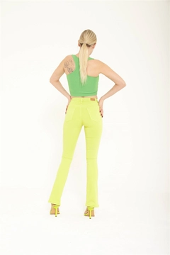 A wholesale clothing model wears lfn11532-slit-detailed-jeans-green, Turkish wholesale Jeans of Lefon