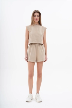 A wholesale clothing model wears lfn11550-sleeveless-shorts-set-beige, Turkish wholesale Suit of Lefon