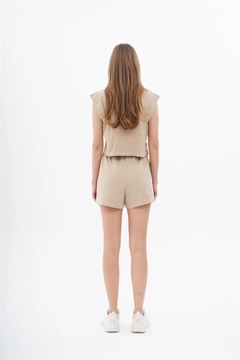 A wholesale clothing model wears lfn11550-sleeveless-shorts-set-beige, Turkish wholesale Suit of Lefon