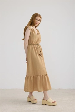 A wholesale clothing model wears lev10407-lace-detailed-belted-linen-dress-biscuit, Turkish wholesale Dress of Levure