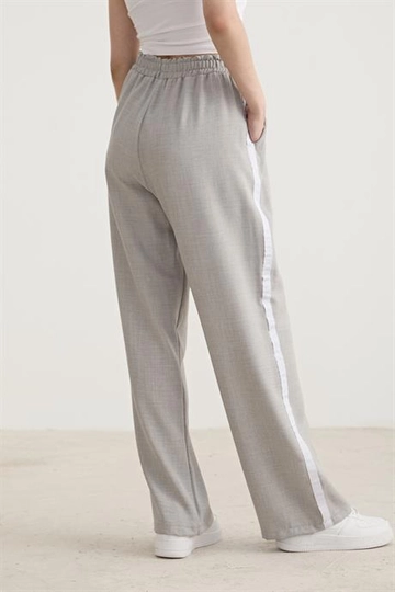 A wholesale clothing model wears  White Stripe Detailed Elastic Trousers Gray
, Turkish wholesale Pants of Levure