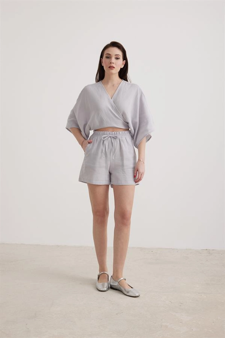 A wholesale clothing model wears lev10009-women's-muslin-tie-blouse-gray, Turkish wholesale Crop Top of Levure