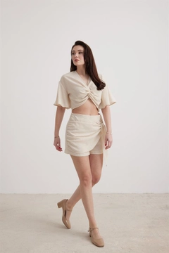A wholesale clothing model wears lev10032-women's-linen-tie-front-shorts-skirt, Turkish wholesale Shorts of Levure
