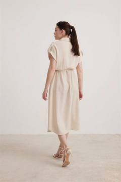 A wholesale clothing model wears lev10039-low-sleeve-buttoned-women's-midi-dress-stone, Turkish wholesale Dress of Levure