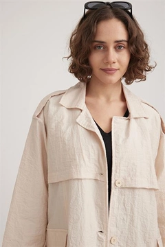 A wholesale clothing model wears lev10333-stone, Turkish wholesale Trenchcoat of Levure