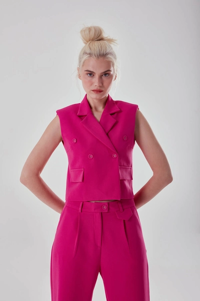 A model wears MZC10027 - Double Breasted Vest - Fuchsia, wholesale Vest of MZL Collection to display at Lonca