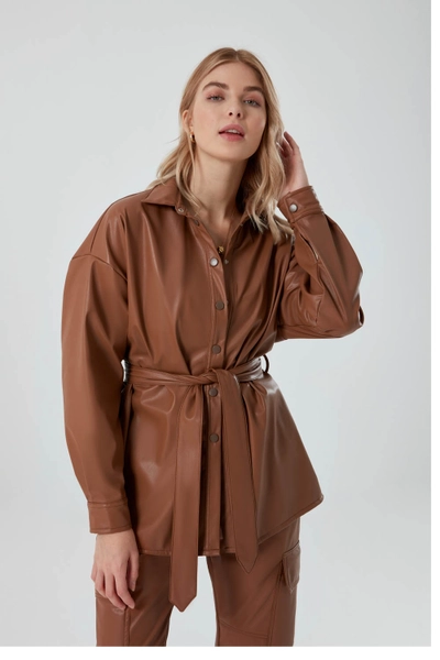 A model wears MZC10034 - Leather Detailed Tunic - Camel, wholesale Tunic of MZL Collection to display at Lonca
