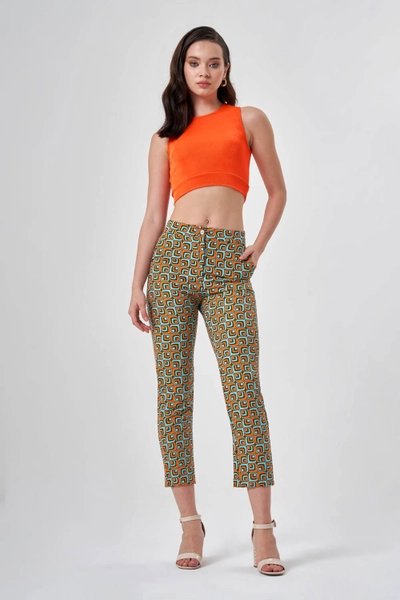 A model wears MZC10183 - Pants - Orange, wholesale Pants of MZL Collection to display at Lonca