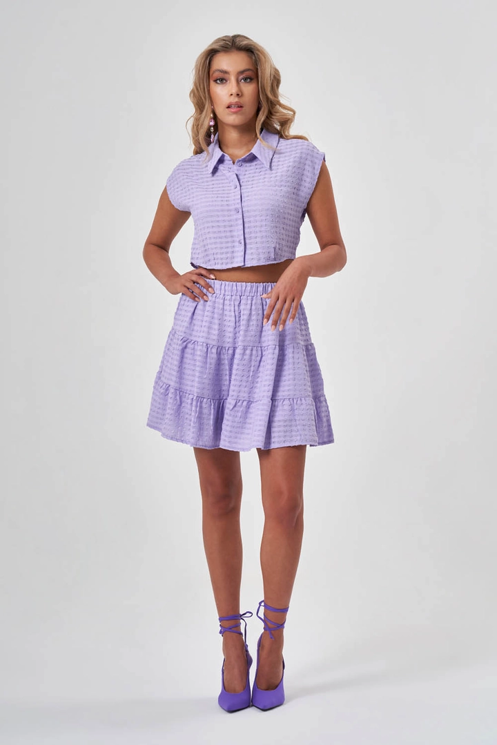 A wholesale clothing model wears MZC10150 - Skirt - Lilac, Turkish wholesale Skirt of MZL Collection