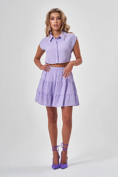 A model wears MZC10150 - Skirt - Lilac, wholesale Skirt of MZL Collection to display at Lonca
