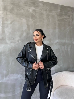 A wholesale clothing model wears 10004-leather-jacket-black, Turkish wholesale Jacket of Maestro Woman