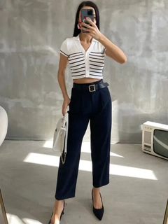 A wholesale clothing model wears mae10014-belted-trousers-navy-blue, Turkish wholesale Pants of Maestro Woman