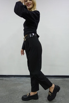 A wholesale clothing model wears mae10015-belted-trousers-black, Turkish wholesale Pants of Maestro Woman