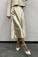 A wholesale clothing model wears mae10023-satin-midi-skirt-beige, Turkish wholesale  of 