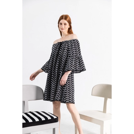 A model wears 23348 - Off the Shoulder Oversize Dress - Black, wholesale Dress of Mare Style to display at Lonca