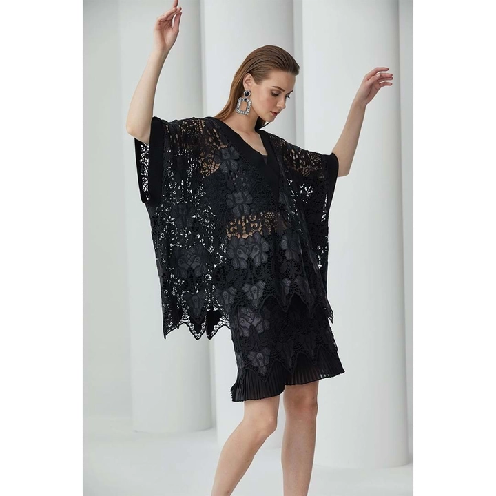 A wholesale clothing model wears 23361 - Guipure Detailed Imitation Leather Oversize Embroidery Blouse - Black, Turkish wholesale Blouse of Mare Style